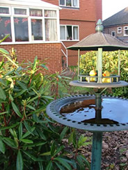 Bird bath in the grounds of the Gables Nursing Home Pudsey